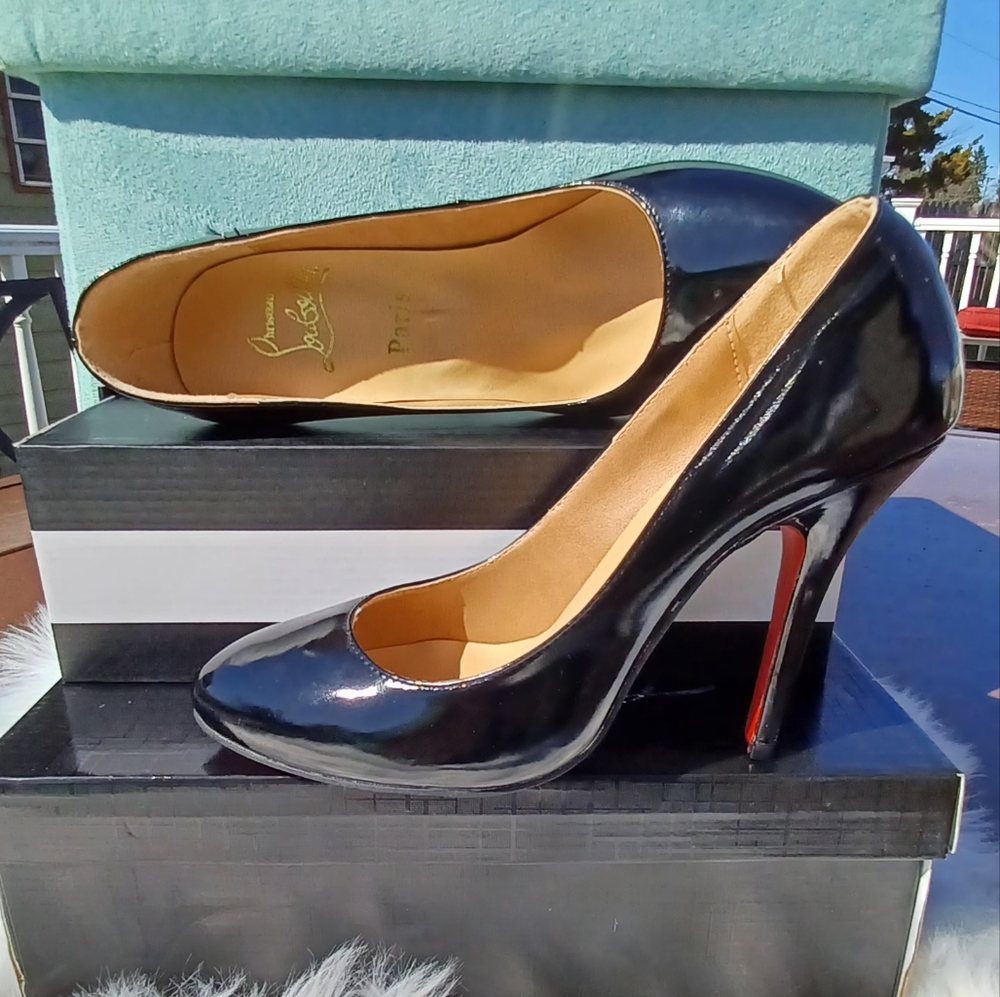 Christian Louboutin Black Patent Pumps with Signature Red Soles